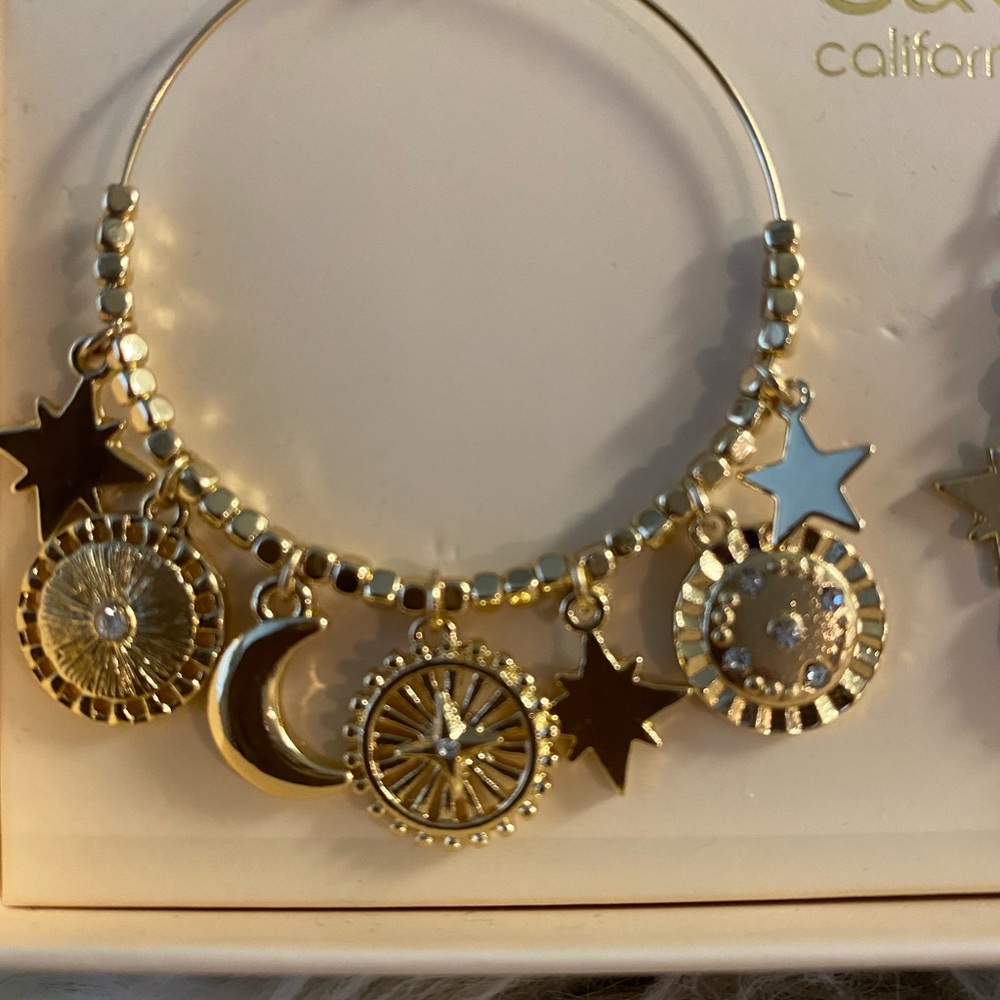 Fancy earrings gold plate brand new